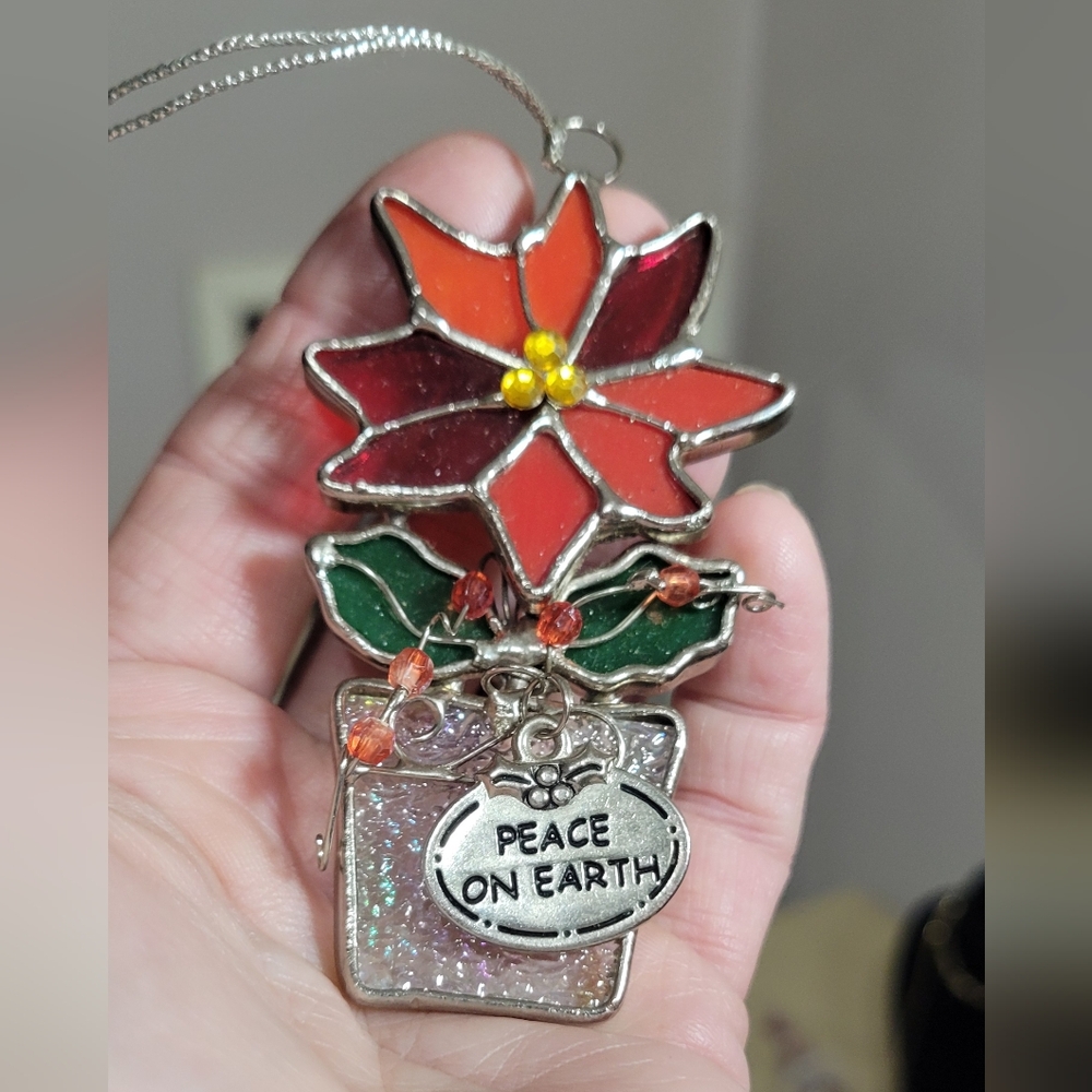 Festive Poinsettia Ornament with Peace Charm